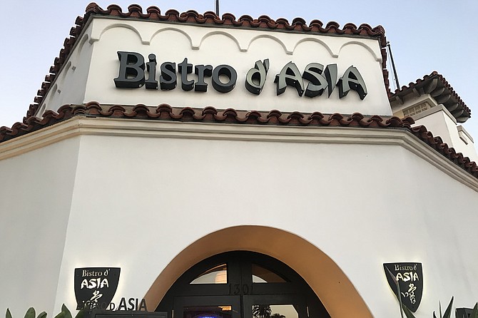 At Orange and B, the iconic Bistro d’Asia building.