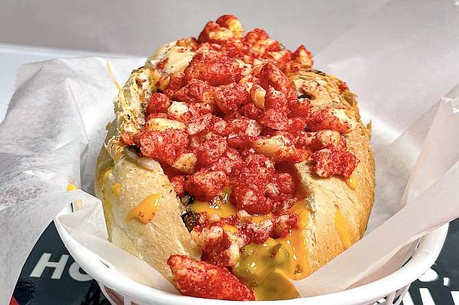 Cheesesteak is the latest food we've seen dressed with Flamin' Hot Cheetos.