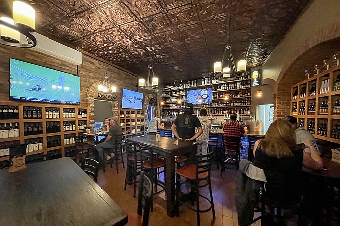 Still brick arches and bronze ceiling tiles, now with a more beery focus