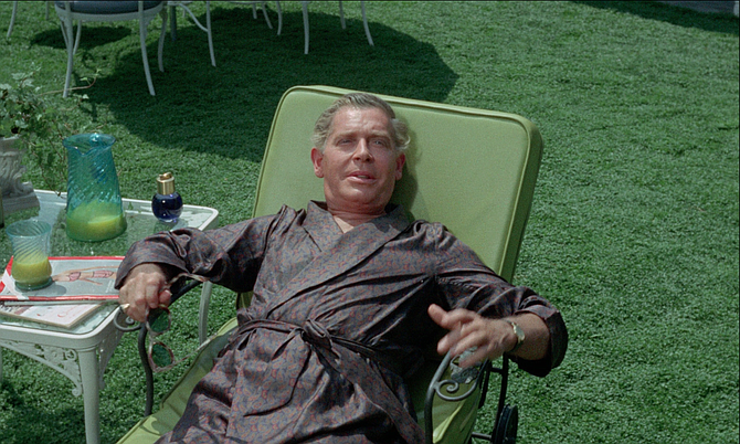 Like the snake that sheds its skin, Kappy Kappsteader (Milton Berle) separates himself of Frank Fane.