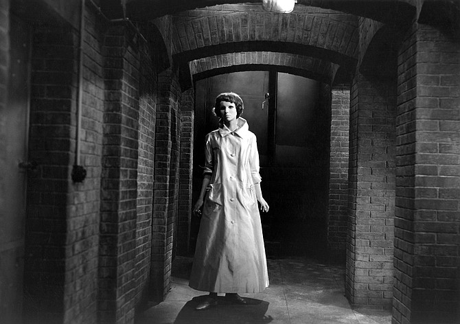 A haunted (and haunting) Édith Scob in George Franju's Eyes Without a Face.