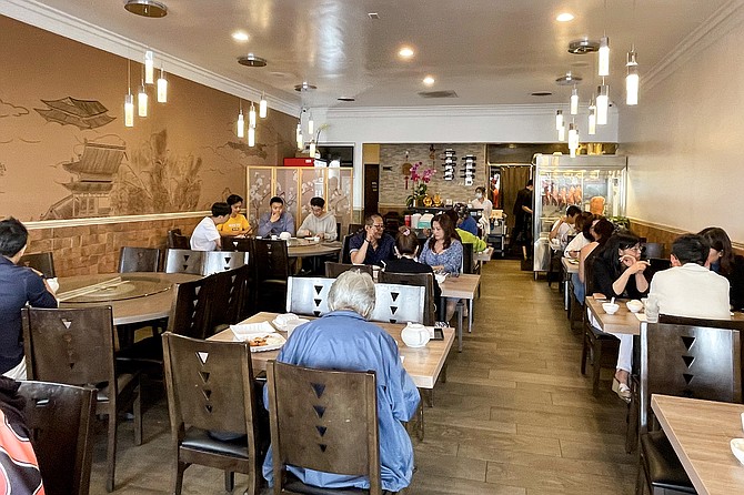 A restaurant keeping busy for lunch on a weekday