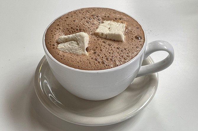 A mug of "drinking cacao" with maple sugar marshmallows