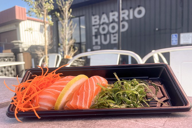 Salmon sushi nigiri served by Fuku Sushi, a virtual restaurant tenant of the Barrio Food Hub