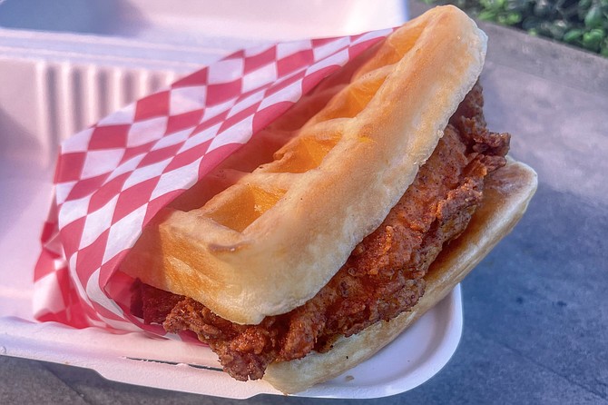A hot chicken and waffle sandwich from ghost kitchen Hot Thang!