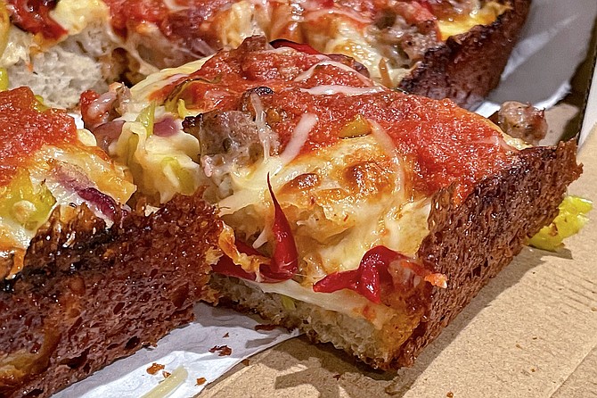 Detroit-style pizza: cooked in a deep, rectangular pan so that the cheese crisps up at the crust