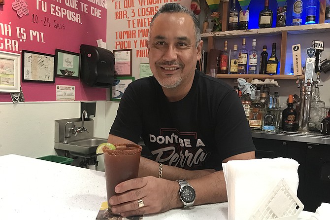 Antonio, one of three brothers who run La Vecindad.
