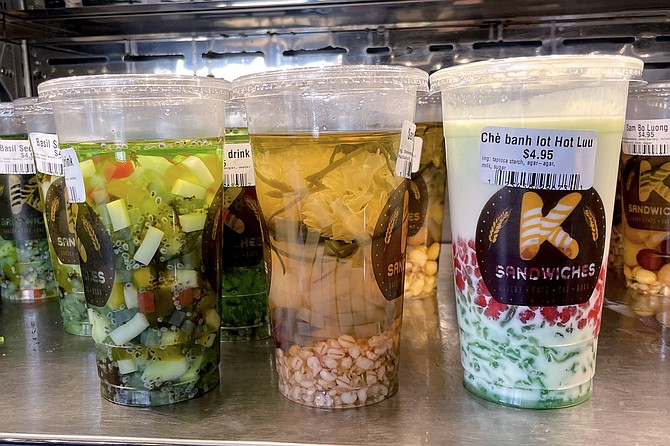 An assortment of Vietnamese dessert drinks found in the K Sandwiches cooler