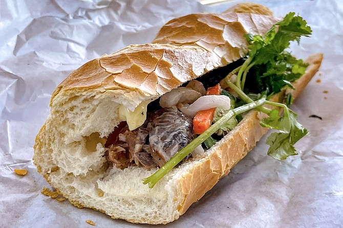 A sardine bánh mì, on a flaky-crusted baguette, from K Sandwiches in Linda Vista