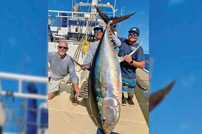 Angler Jim Fitch with his cow tuna caught while fishing aboard the Intrepid 14-day trip.