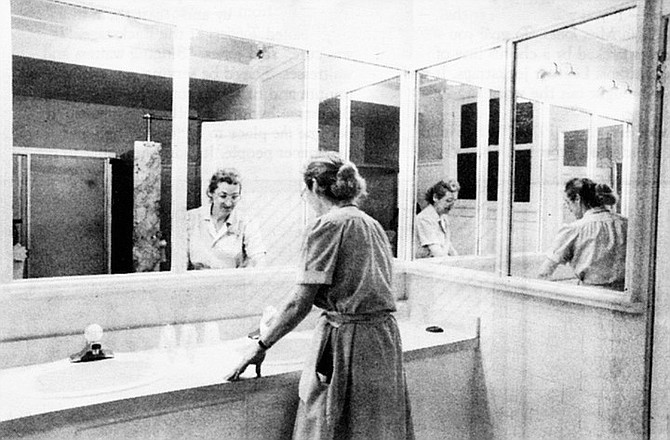 The bathroom, Suite 264. "They went back to 264. Maria refused to go inside with them. By then, the front desk had called hotel security. Maria had become hysterical." - Image by Byron Pepper