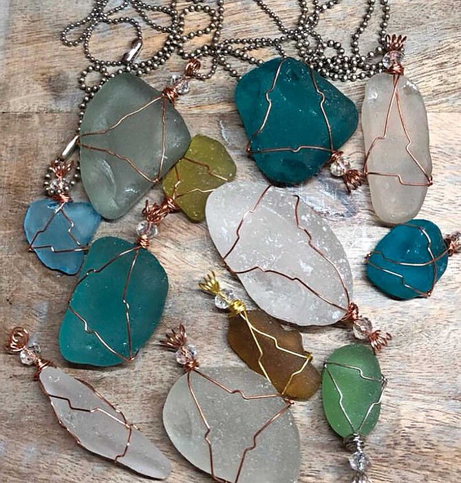 Bressi makes jewelry out of the glass she finds on the beach.