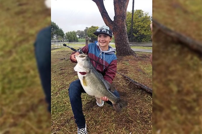 A very happy Braeden Steveson of Santee with his lake record 15.12-pound largemouth bass.