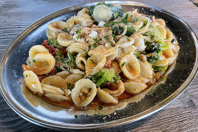 Ear shaped pasta (orecchiette) with sausage, broccoli, and tomato
