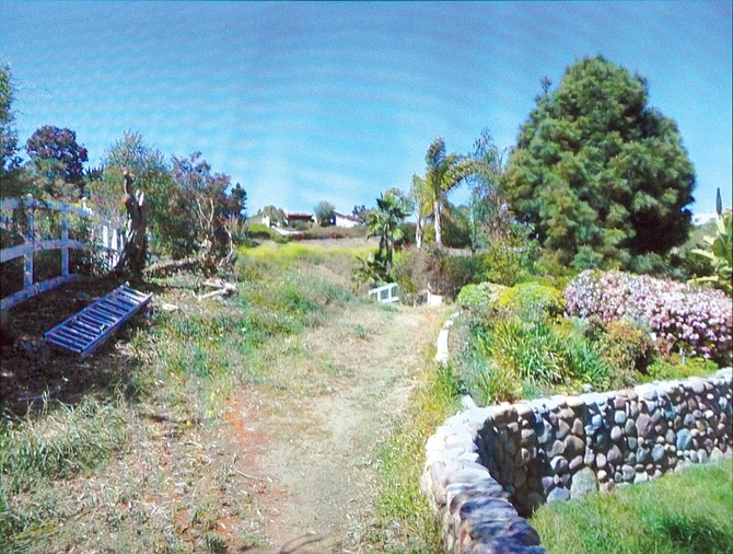Evidence photo of the stone wall, which encroached 17 feet onto Vilkin’s land.