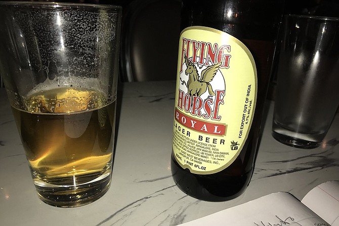 Indian beers a-plenty. HH pints ar $5, large bottles, $10.