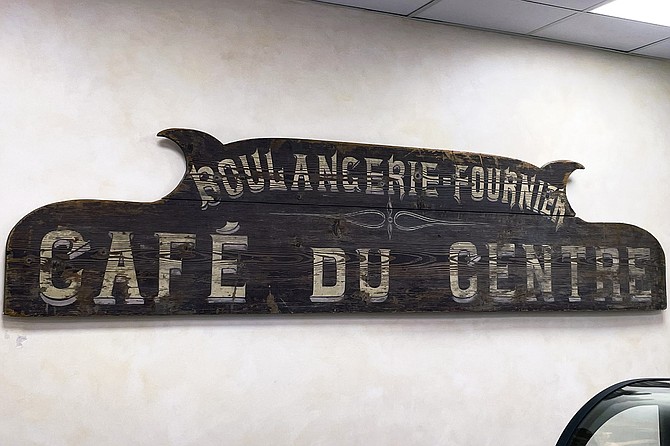 A sign taken from the family bakery in France, established in 1840