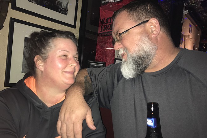 Love conquers all: Sandy and Brandon at The Waterfront before returning to freezing Arkansas.