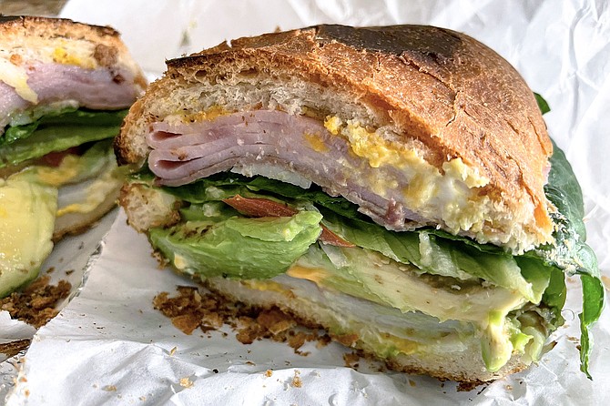 A mixed torta, made with ham, turkey, and roast beef