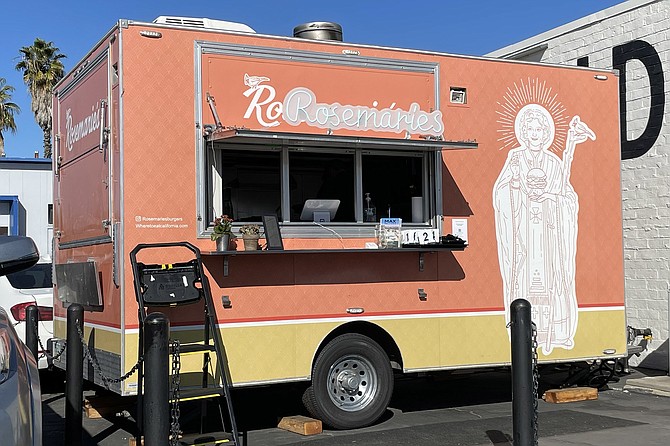 A trailer kitchen parked outside Harland Brewing Bay Park