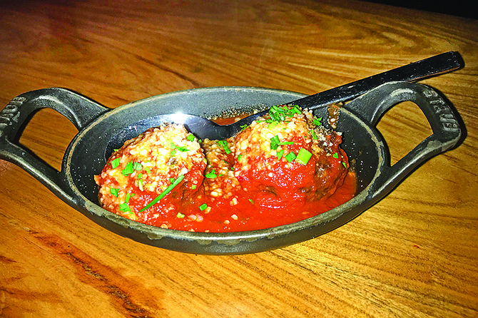 Two giant meatballs, best bargains in Happy Hour.