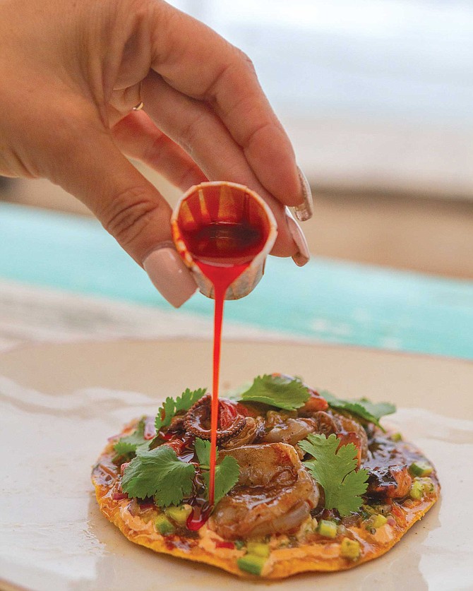 Tostada de jurel covered in salsa matcha at Pacific Brews Collective.