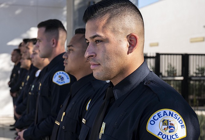 Ten of the 11 new Oceanside police officers sworn in February 10.