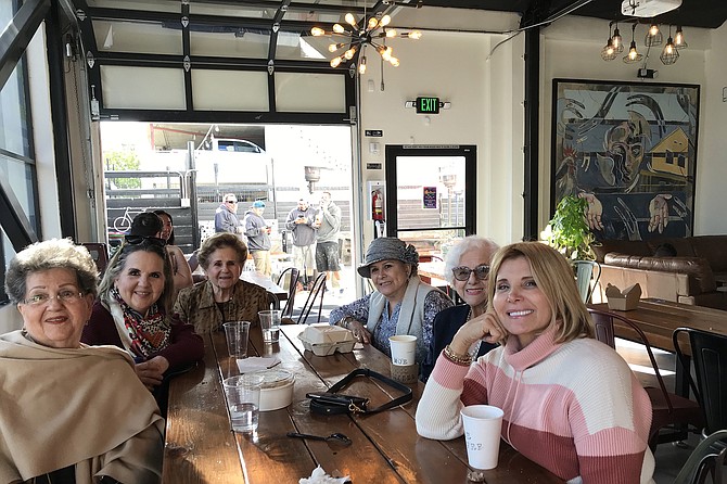 Ladies’ group’s new meeting spot. Note table: Recovered planks from previous building.