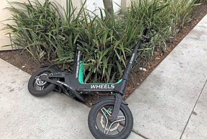 Scooter dumped on 4th Ave. February 21