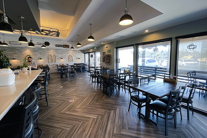 For only a few moments before lunch, the dining room remains empty.