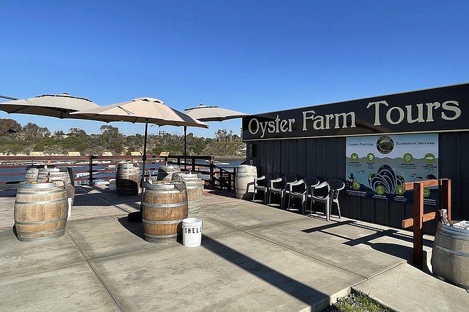 An aqua farm offers tours on the banks of Agua Hedionda Lagoon