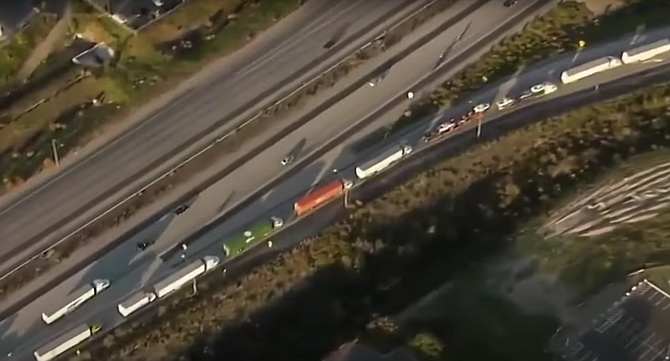 On an ABC 10 News aerial shot of the border, it depicts dozens of semi-trucks were back up into the 905 freeway.