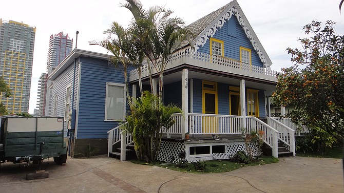 Update March 2: I went by the Sherman house, and the wood trim has been painted yellow.
