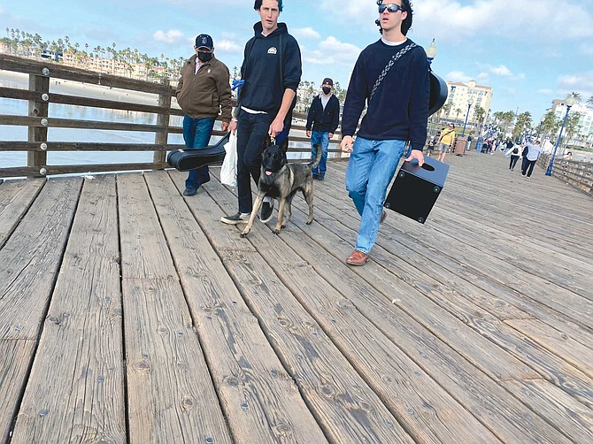 Oceanside Lifeguard Sergeant Greg Trebbe says, “Dogs have been prohibited on the pier for as long as I can remember – it’s in the city’s municipal code.”