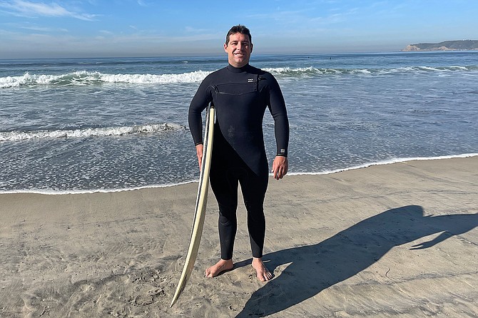 Sean Hogan (36) surfs Outlet, Coronado.