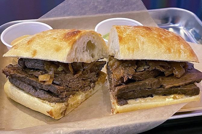 The asado sandwich, topped by aji pepper seasoned pot roast