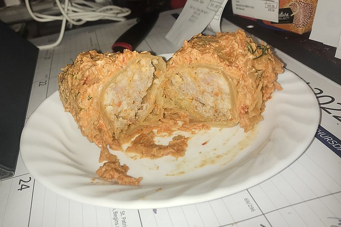 Inside of a Golubtsi: mostly meats. Outside: cabbage leaf and delightful gunk.