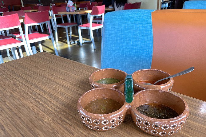 Four different salsas, served in what is usually a breakfast booth