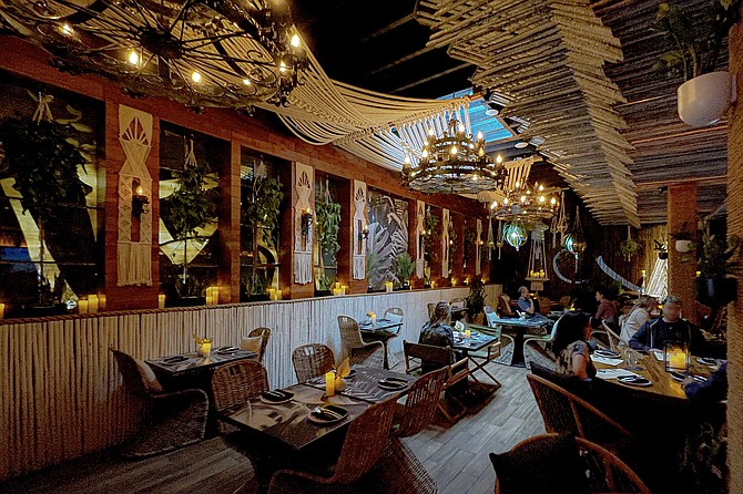 A bamboo and macrame dining room and bar