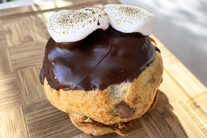 The s'mores cream puff, topped with toasted marshmallows