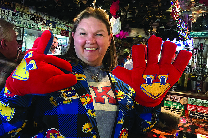 Fan Stephanie drives Jayhawks support for the UNC-Kansas game.