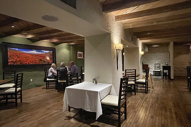 The Fox Bistro dining room straddles a line between elegant and casual.