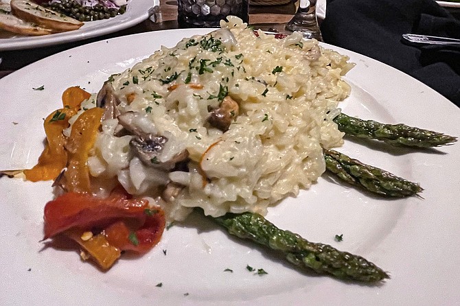 Mushroom risotto with roasted vegetables and asparagus