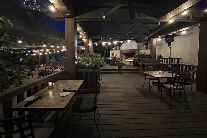 The rose garden terrace makes a case for outdoor dining in the desert.