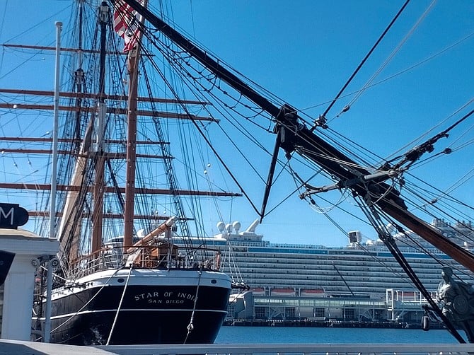 Contrast of the old Star Of India sailing ship and a modern cruise ship.