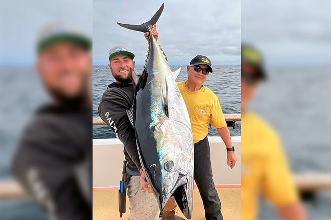 A waning bite during a waxing moon didn’t faze angler Dave Henderson, here with a quality bluefin tuna caught using a knife jig while fishing aboard the Intrepid.