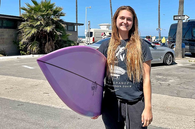 Emily Collins(25) surfs Blacks