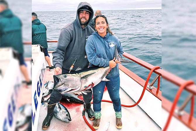 A happy angler with a 50-pound class bluefin tuna caught while fishing aboard the Legend during a 1.5 day outing