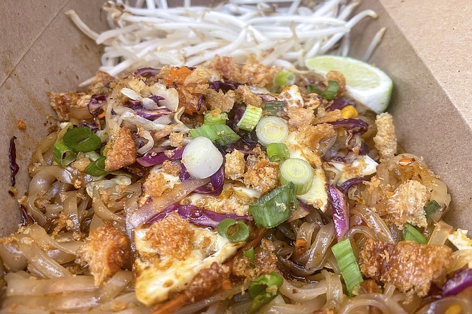 The boran (old style) pad thai, topped with vegetables and pork rinds
