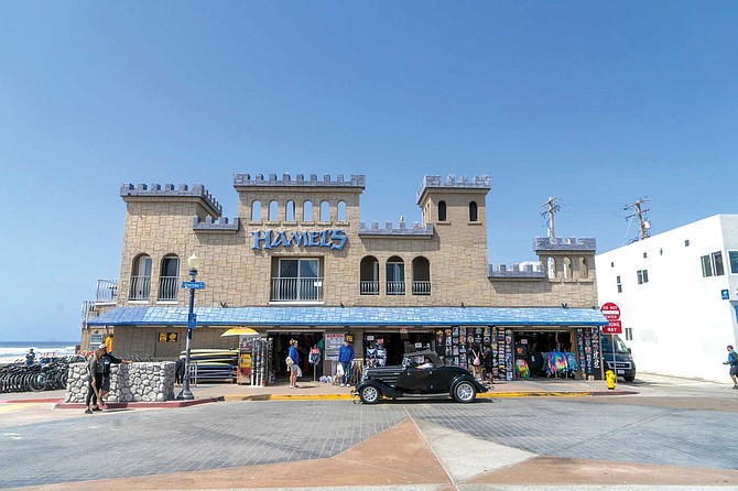 Hamel’s Action Sports Center, situated in a waterfront building remodeled many years ago to resemble a cartoonish castle. Bike rentals, skate repair, T-shirts and swimwear and towels and whatever else you might need for a day in the sun.